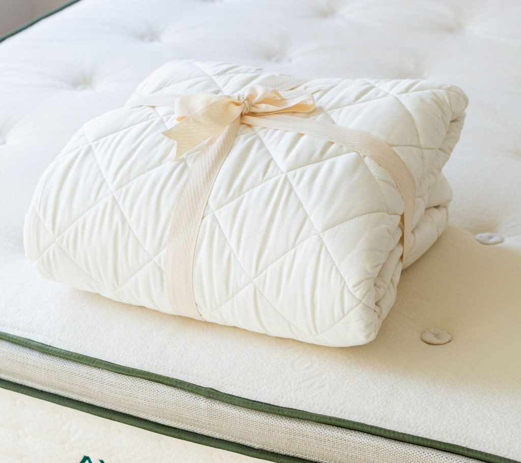 Best Mattress Pads for (2022) - Editors top 11 picks 4 Avocado Organic Mattress Pad Carousel 1 compressor